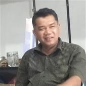 Á